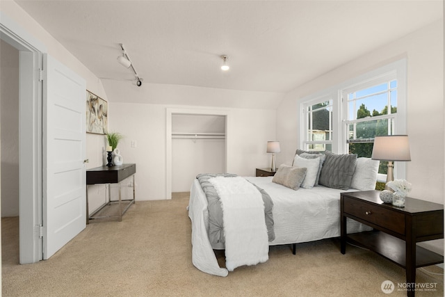 5803 Latona Ave NE, Seattle, WA 98105 - bedroom featuring light carpet and a closet