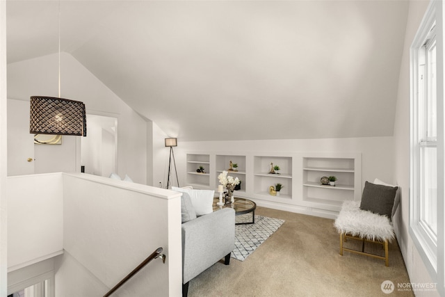 5803 Latona Ave NE, Seattle, WA 98105 - carpeted living room featuring built in shelves and lofted ceiling