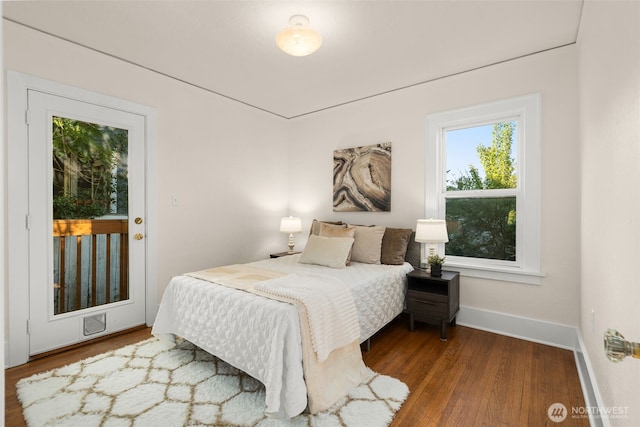5803 Latona Ave NE, Seattle, WA 98105 - bedroom with wood finished floors and access to outside