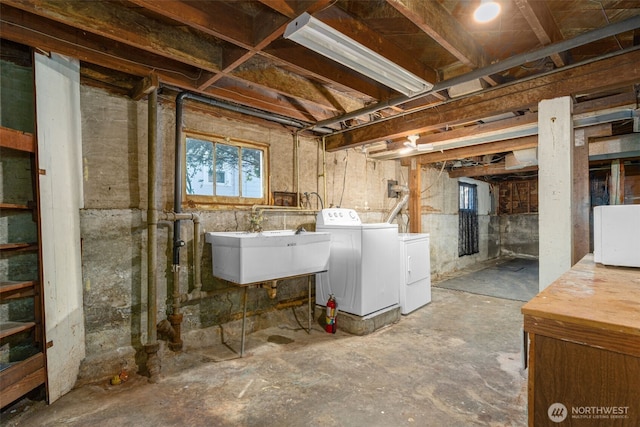 5803 Latona Ave NE, Seattle, WA 98105 - below grade area featuring washing machine and clothes dryer and a sink
