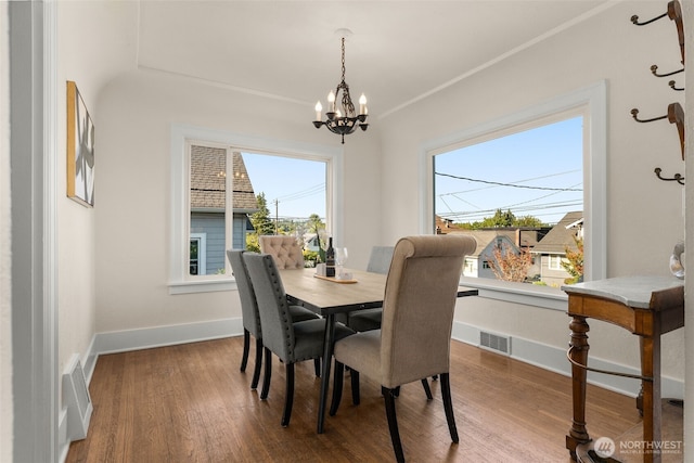 5803 Latona Ave NE, Seattle, WA 98105 - dining room featuring a chandelier and wood finished floors