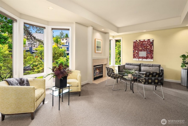 5115 NE Latimer Pl, Seattle, WA 98105 - living area featuring plenty of natural light, a fireplace with flush hearth, recessed lighting, and carpet