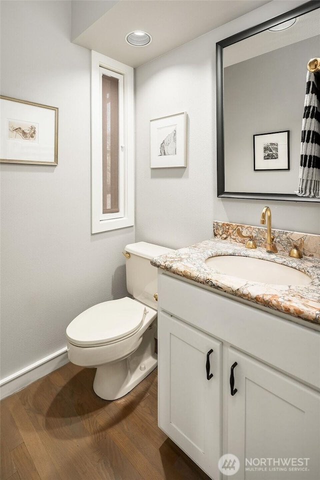 5115 NE Latimer Pl, Seattle, WA 98105 - half bath with vanity and wood finished floors
