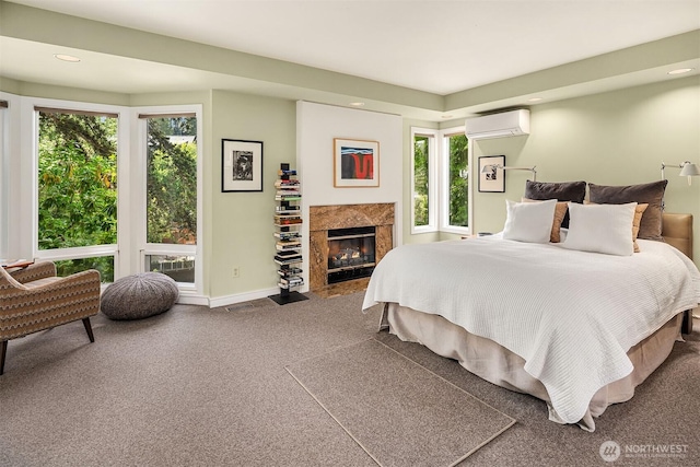 5115 NE Latimer Pl, Seattle, WA 98105 - carpeted bedroom featuring recessed lighting, a wall unit AC, and a fireplace