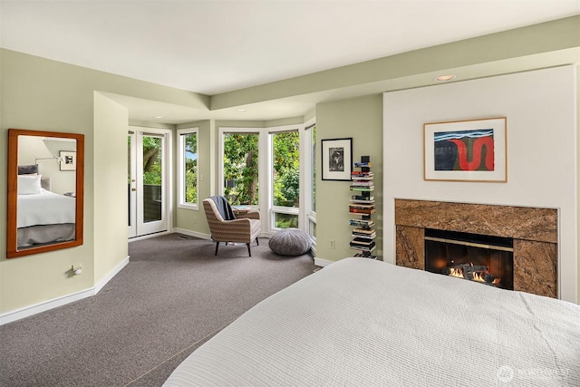 5115 NE Latimer Pl, Seattle, WA 98105 - bedroom featuring access to outside, carpet flooring, a high end fireplace, and recessed lighting