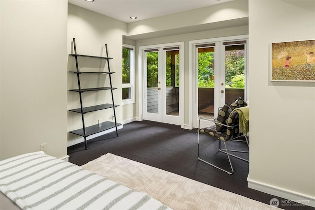 5115 NE Latimer Pl, Seattle, WA 98105 - bedroom featuring french doors, access to exterior, dark carpet, and recessed lighting