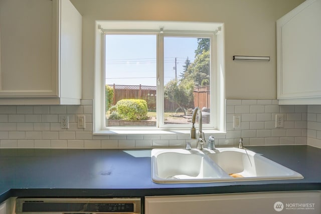 3300 NE 90th Cir, Vancouver, WA 98665 - kitchen with dark countertops, white cabinets, dishwasher, and decorative backsplash