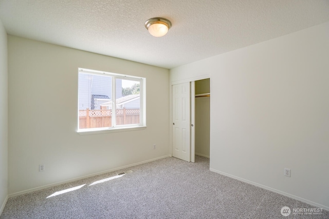 3300 NE 90th Cir, Vancouver, WA 98665 - unfurnished bedroom featuring carpet, a closet, and a textured ceiling