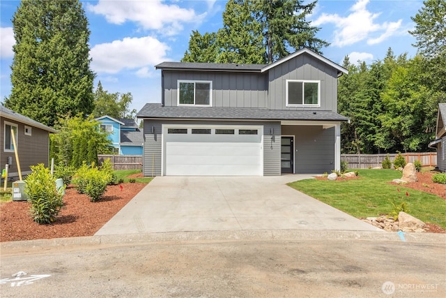4710 Sagebrush Ln, Blaine, WA 98230 - traditional home with an attached garage, board and batten siding, driveway, and roof with shingles