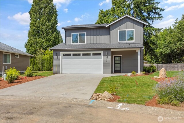 4710 Sagebrush Ln, Blaine, WA 98230 - traditional-style home with board and batten siding, an attached garage, concrete driveway, and a shingled roof
