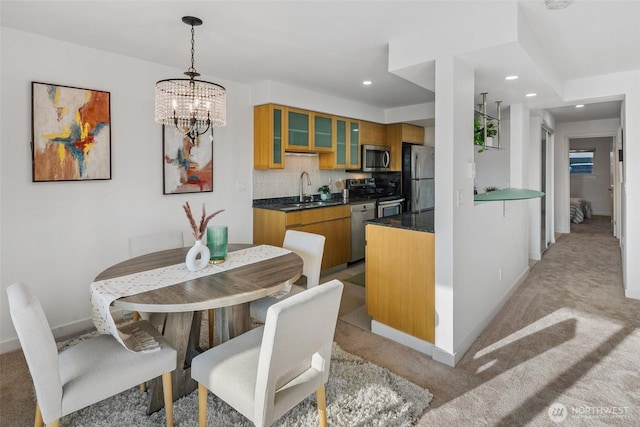 701 122nd Ave NE Unit 207, Bellevue, WA 98005 - dining space with light carpet, a chandelier, and recessed lighting