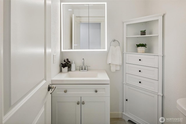 701 122nd Ave NE Unit 207, Bellevue, WA 98005 - bathroom featuring vanity and toilet