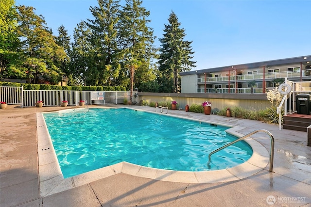 701 122nd Ave NE Unit 207, Bellevue, WA 98005 - community pool with a patio area