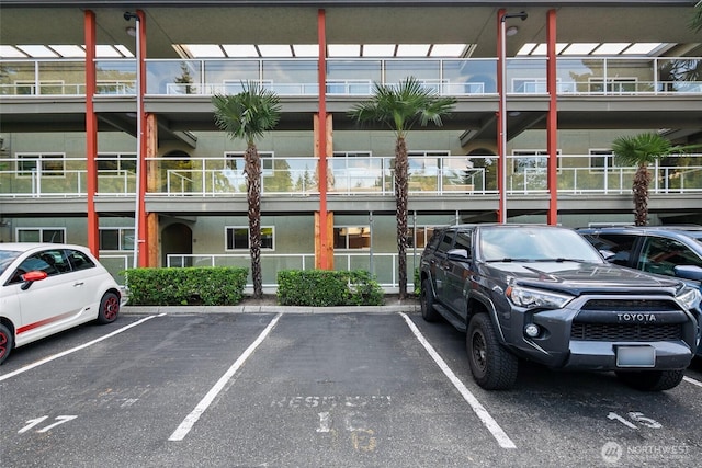 701 122nd Ave NE Unit 207, Bellevue, WA 98005 - view of uncovered parking lot