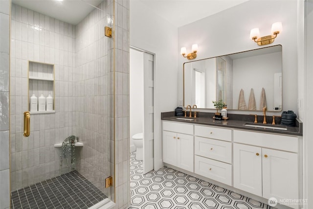 135 Main St E, Packwood, WA 98361 - bathroom featuring double vanity, a shower stall, and tile patterned floors