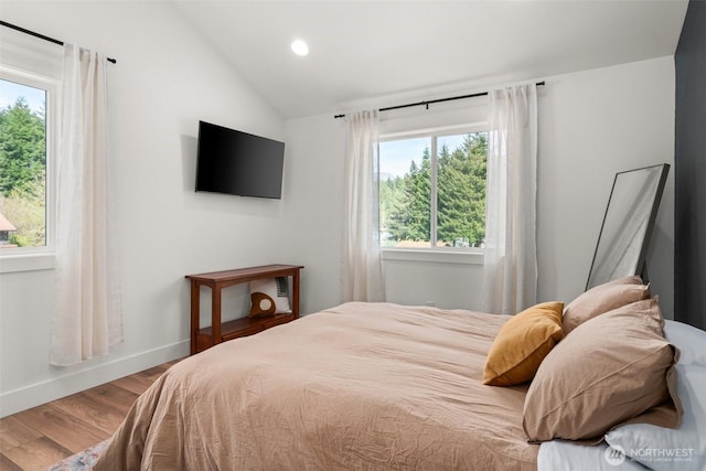 135 Main St E, Packwood, WA 98361 - bedroom featuring vaulted ceiling, wood finished floors, and recessed lighting