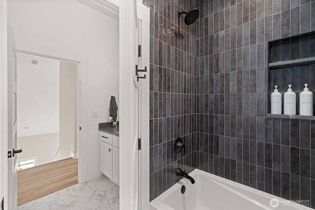 135 Main St E, Packwood, WA 98361 - full bathroom featuring marble look tile flooring, bathing tub / shower combination, and vanity