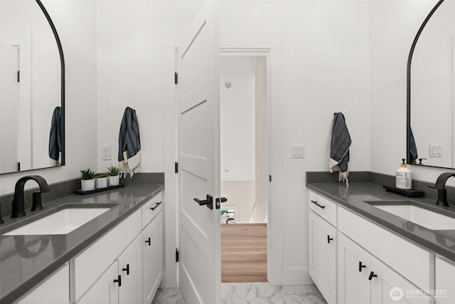 135 Main St E, Packwood, WA 98361 - bathroom with marble finish floors and two vanities