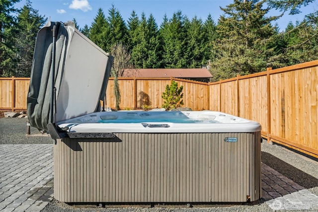 135 Main St E, Packwood, WA 98361 - fenced backyard featuring a hot tub