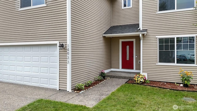 14933 Terra View St SE, Yelm, WA 98597 - view of exterior entry with a garage