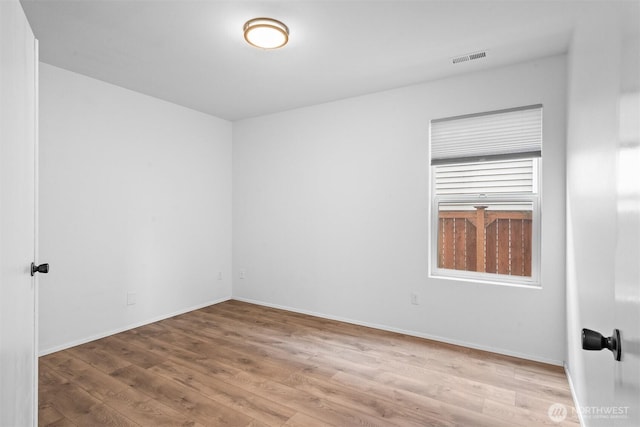 14933 Terra View St SE, Yelm, WA 98597 - spare room with wood finished floors and baseboards