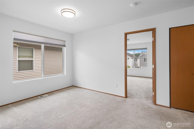 14933 Terra View St SE, Yelm, WA 98597 - spare room featuring carpet flooring and a smoke detector