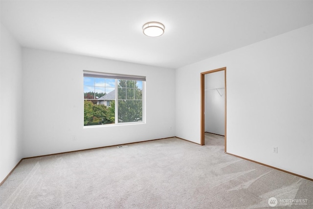 14933 Terra View St SE, Yelm, WA 98597 - empty room with carpet floors and baseboards