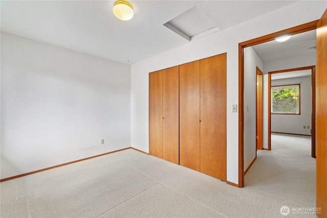 18910 Bothell Everett Hwy Unit K3, Bothell, WA 98012 - unfurnished bedroom with carpet floors, attic access, and a closet