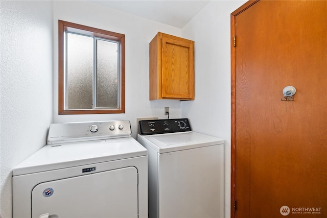 18910 Bothell Everett Hwy Unit K3, Bothell, WA 98012 - washroom with washer and clothes dryer and cabinet space