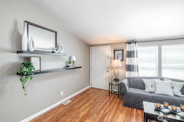 16420 SE 269th St SE, Covington, WA 98042 - living area with wood finished floors and vaulted ceiling