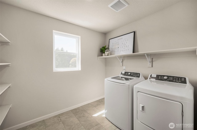 2605 S 8th Way, Ridgefield, WA 98642 - laundry area with washing machine and dryer and baseboards