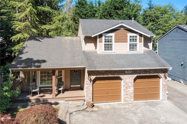 7829 197th Ave E, Bonney Lake, WA 98391 - view of front of house featuring brick siding, a porch, and roof with shingles