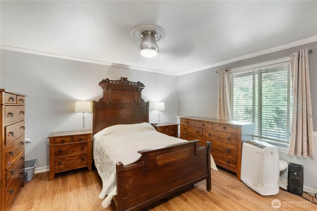 7829 197th Ave E, Bonney Lake, WA 98391 - bedroom with crown molding, light wood-style floors, and a ceiling fan