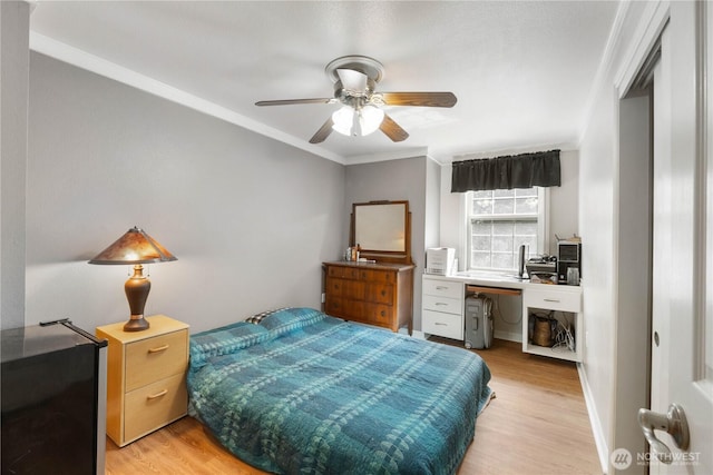 7829 197th Ave E, Bonney Lake, WA 98391 - bedroom featuring light wood-type flooring, ornamental molding, and ceiling fan