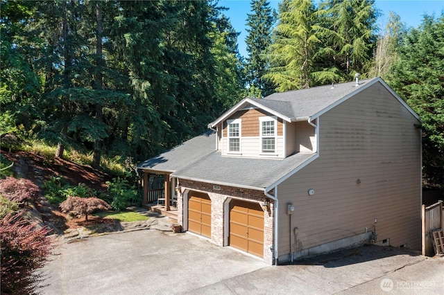 7829 197th Ave E, Bonney Lake, WA 98391 - view of home's exterior featuring asphalt driveway and roof with shingles