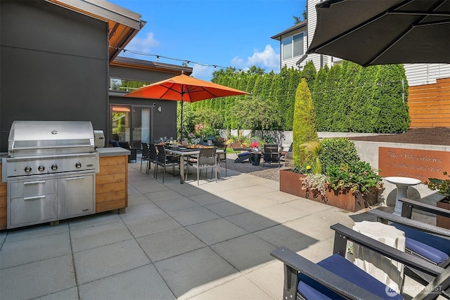 1808 2nd St, Kirkland, WA 98033 - view of patio featuring outdoor dining area and exterior kitchen