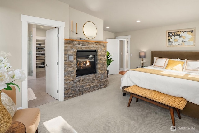 1808 2nd St, Kirkland, WA 98033 - bedroom featuring a fireplace, a spacious closet, light colored carpet, and recessed lighting
