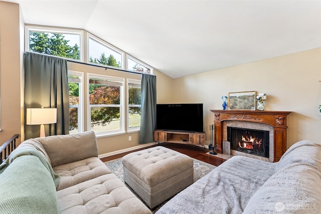 4201 SW 328th Ct, Federal Way, WA 98023 - living room with vaulted ceiling, wood finished floors, and a fireplace with flush hearth