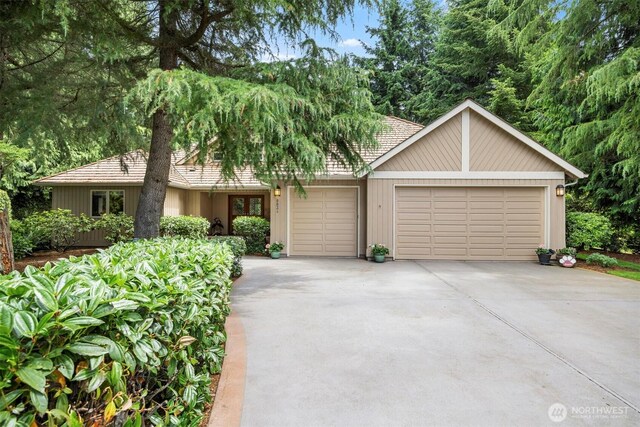 8834 Goldeneye Ln, Blaine, WA 98230 - view of front of property featuring a garage and driveway