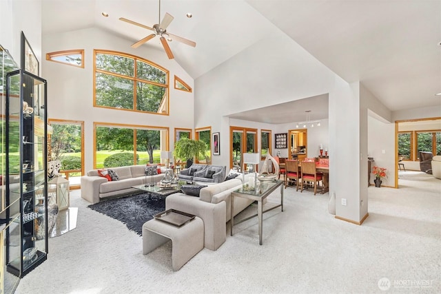 8834 Goldeneye Ln, Blaine, WA 98230 - living room featuring carpet flooring, high vaulted ceiling, and a ceiling fan