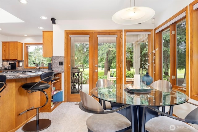8834 Goldeneye Ln, Blaine, WA 98230 - dining room featuring recessed lighting and french doors