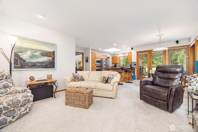 8834 Goldeneye Ln, Blaine, WA 98230 - living room with light carpet, recessed lighting, and plenty of natural light