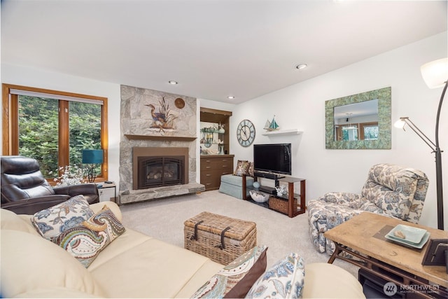 8834 Goldeneye Ln, Blaine, WA 98230 - carpeted living area featuring a fireplace and recessed lighting