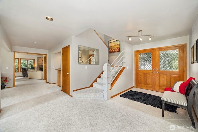 8834 Goldeneye Ln, Blaine, WA 98230 - foyer with stairway and light carpet