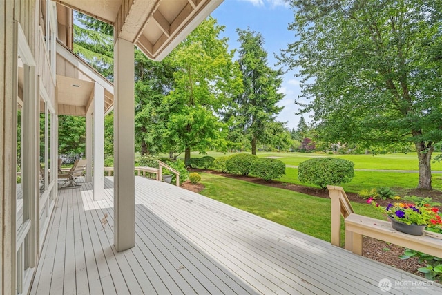 8834 Goldeneye Ln, Blaine, WA 98230 - wooden terrace featuring a yard and view of wooded area