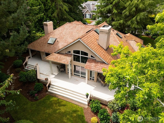 8834 Goldeneye Ln, Blaine, WA 98230 - back of house with a chimney