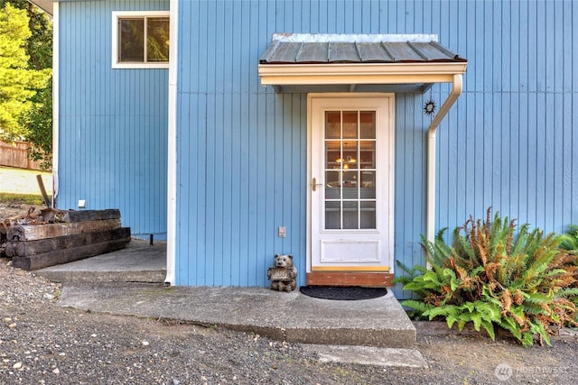 1171 E Mason Lake Dr E, Grapeview, WA 98546 - property entrance featuring a standing seam roof and a metal roof