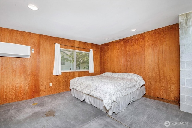 1171 E Mason Lake Dr E, Grapeview, WA 98546 - bedroom featuring carpet, wood walls, an AC wall unit, and recessed lighting