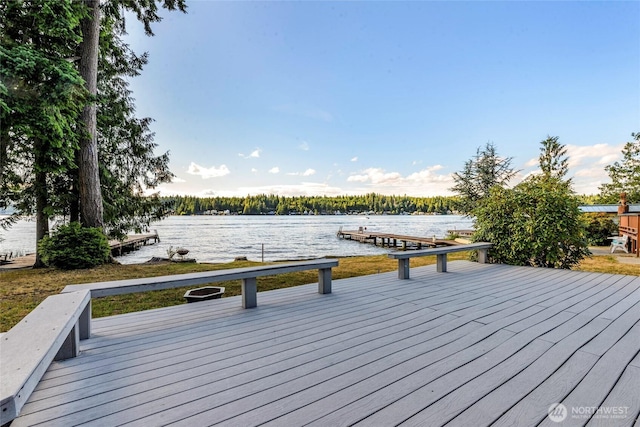 1171 E Mason Lake Dr E, Grapeview, WA 98546 - wooden terrace featuring a water view and a dock
