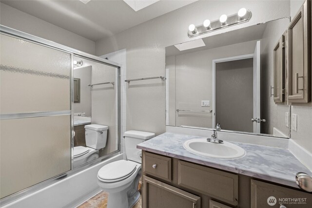 742 N 103rd St, Seattle, WA 98133 - full bathroom featuring vanity and combined bath / shower with glass door